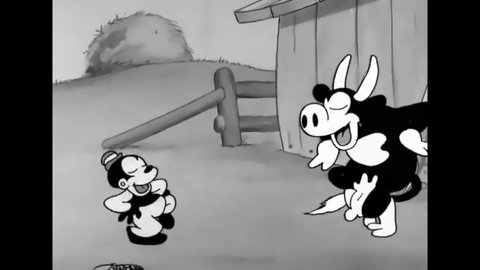 CIRCA 1930 - In this animated film, Bosko dances with a cow on a farm.