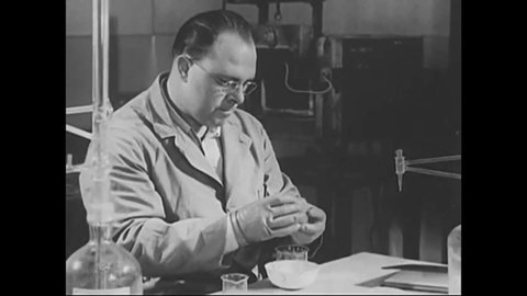 CIRCA 1950s - Scientists test radioactive eggs at a nuclear laboratory in the 1950s.