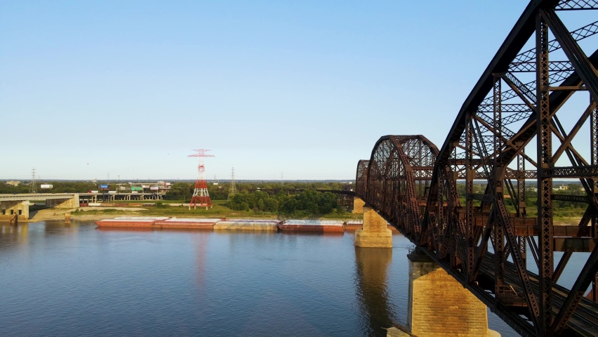 Railroad Bridge Crossing Mississippi River from St. Louis, Missouri - Drone Aerial Establishing View