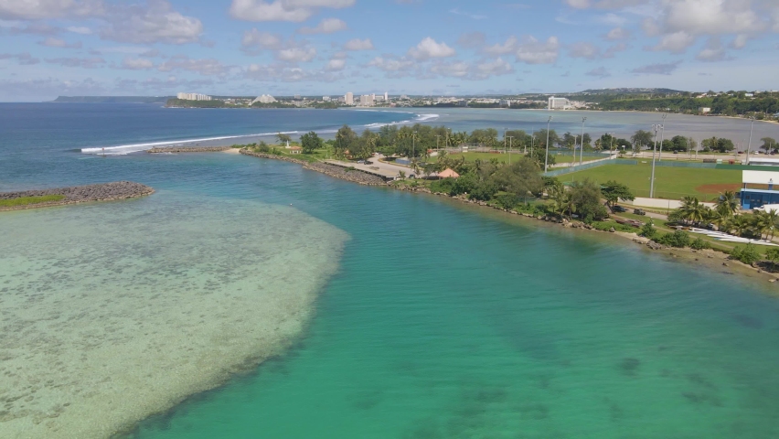 Aerial shot panning down over boat basin marina in agatna-hagatna Guam USA