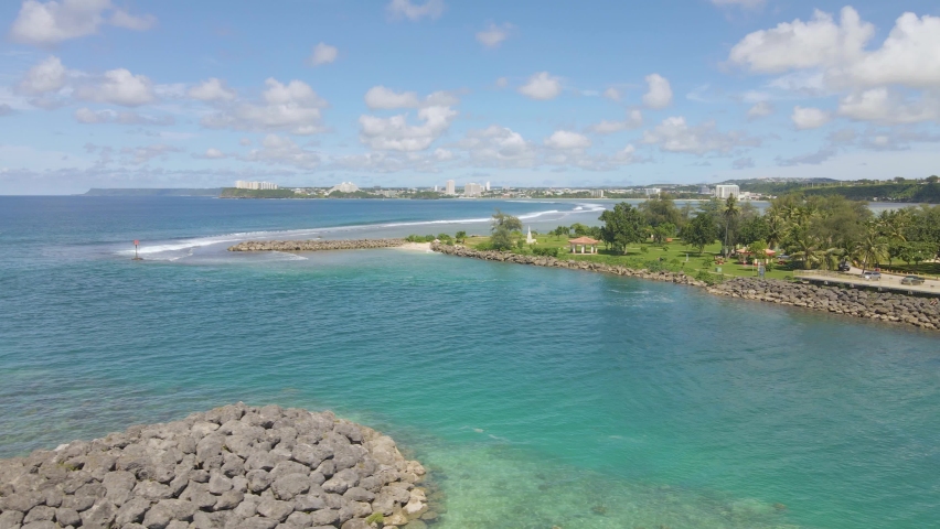 Drone panning over Coral and Statue of Liberty in Agana Bay Guam USA