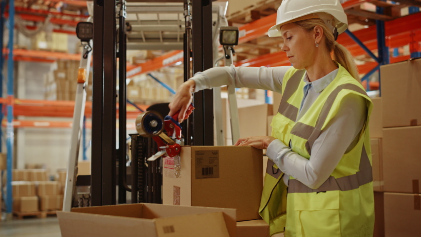 Female Warehouse Inventory Manager Finishes Packing Cardboard Box Closing it and Sealing with Tape Dispenser Sealer. Delivery Distribution Center with Goods, Products Ready for Shipment | Shutterstock HD Video #1060977097