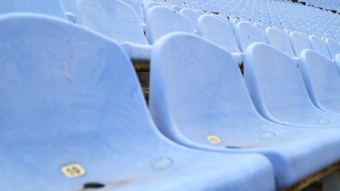 Empty Seats In Stadium. Blue Plastic Seats In  Stadium Without Spectators And Fans