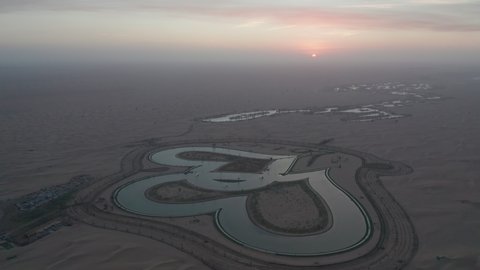 Heart Shaped Love Lake; man made lake located in the deserts of Dubai; Aerial bird's eye view of artificial futuristic lake in Al Qudra, Dubai