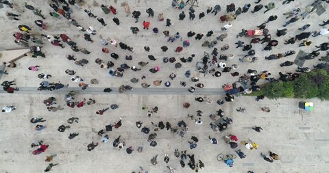 Crowd of people overhead drone shot