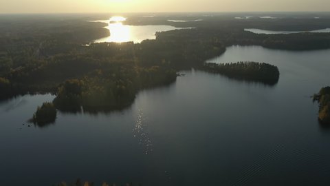 The sun setting in the sky in Lake Saimaa in Finland. Saimaa is a lake in southeastern Finland.Near the Russian-Finnish border.geology video