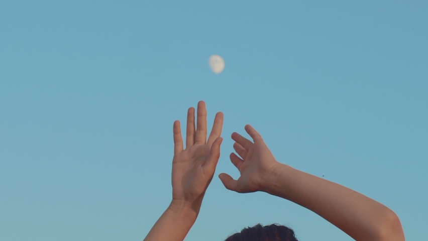 Female hands moving on full moon and blue sky background. Faceless woman dancing tribal outdoors celebrating fullmoon slow motion copy space. Feminism freedom spirit. wellness wilderness nature Royalty-Free Stock Footage #1060999009