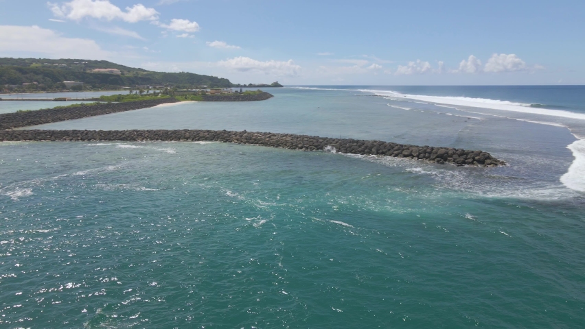 Drone circling around green marker at Hagatna Boat Basin in Guam USA