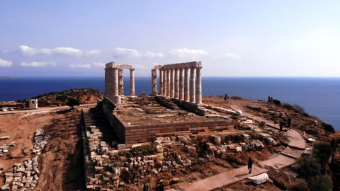 Athens , Lavreotiki / Greece - 12 14 2019: Greek Temple of Poseidon in Athens, low rotating aerial