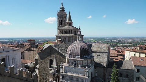 Bergamo, Italy. The old town. Amazing aerial view of the Basilica of Santa Maria Maggiore and the chapel Colleoni. Landscape of the city center and Its landmarks during a wonderful day. Best of Italy