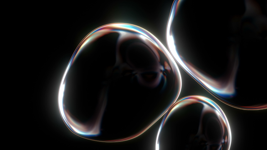 Soap bubbles isolated on black background seamless loop in 4K. Bright soap bubble perfect for digital composing. Abstract Liquid Colorful Motion background.