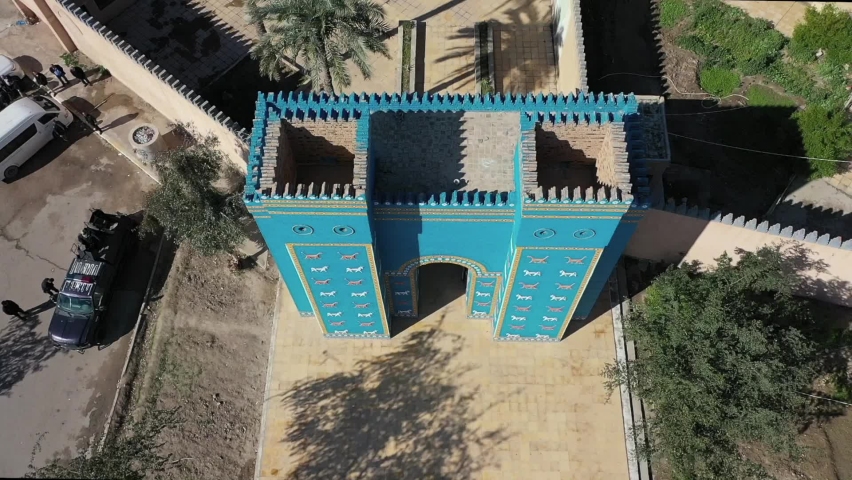 Ishtar Gate and the Lion of Babylon with a theater and the ancient city of Babylon Hilla / Iraq Royalty-Free Stock Footage #1061023471