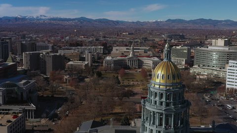 Denver , Colorado / United States - 01 10 2020: Aerial footage over the State Capitol government Building in Downtown Denver, Colorado