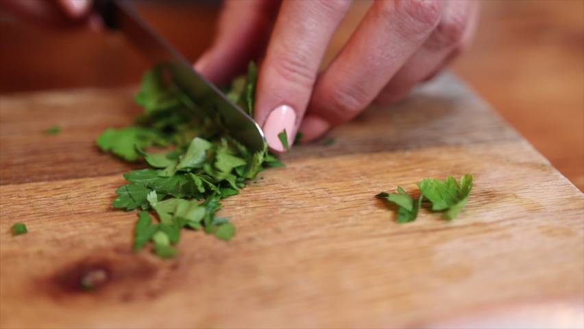 White Chef Chopping Corriander Her