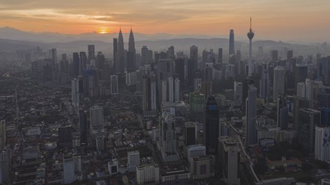 Beautiful City Time lapse: Aerial Kuala Lumpur view during dawn overlooking a city skyline in Federal Territory, Malaysia.