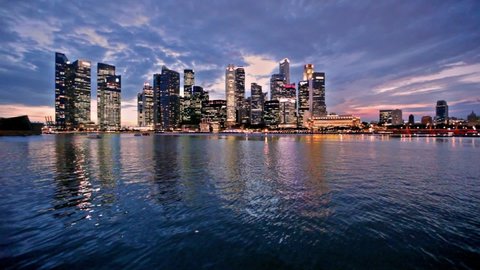 Singapore city skyline at evening with reflection