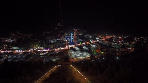 View of Gatlinburg Tennessee at night in the Smokey Mountains . High quality 4k footage. Tourist city in Gatlinburg on autumn night.