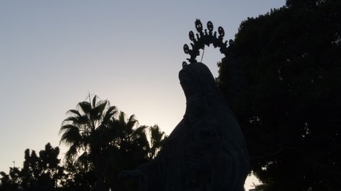Silhouette of a virgin at sunset