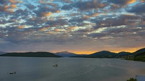 Landscape timelapse of a sunset over Ofotfjord lake in Norway. 4K UHD video.