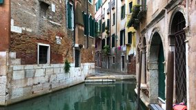 Old houses in filmed residential area Metropolitan City of Venice in Italy.Popular travel destination fro cultural tourism in Venezia,Italia.Royalty free 4K video clip