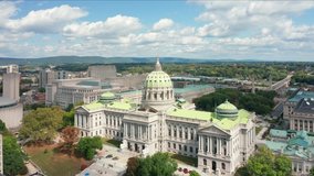 Aerial view of Harrisburg skyline, with slow camera rotation around the Pennsylvania State Capitol
