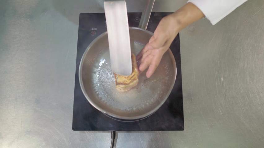 Hot pan with oil, Frying Salmon steak.