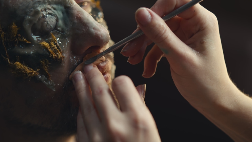 Makeup Artist Doing Man Stock - Zombie Makeup Artist Makeup Artist Doing Man Stock - Zombie Makeup Artist