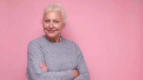 Smiling senior woman looking confident at camera. Positive facial human emotion. - Powered by Shutterstock - Get 15% off with code: PIKWIZARD15