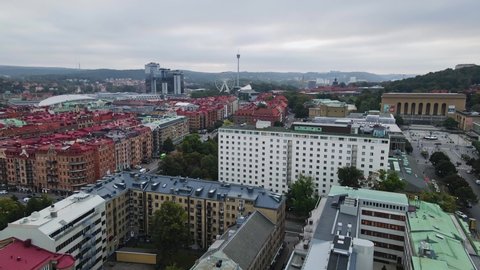 The Scandinavium, Gothia Towers, Ferris Wheel, And AtmosFear At Liseberg Amusement Park Seen From The Lorensberg In Gothenburg, Sweden. - aerial drone shot