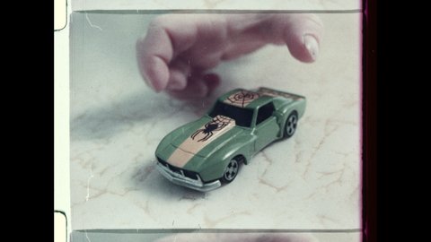 1970's Three Young Boys play with Matchbox Cars. Television Commercial Advertisement. 4K Overscan of Vintage Archival 16mm Film Showing Frame Lines