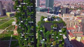 Milan, Italy - October 20, 2020: Aerial view. Modern and ecologic skyscrapers with many trees on every balcony. Bosco Verticale - Powered by Shutterstock - Get 15% off with code: PIKWIZARD15