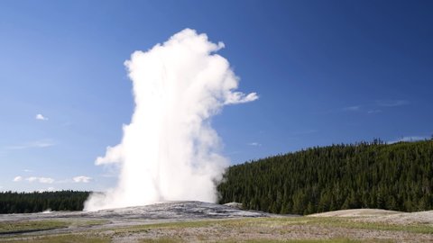 Hot springs, Old Faithful Geyser eruption, Upper Geyser Basin, Yellowstone, USA
