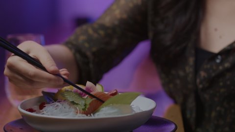 New foods. Never tried sushi before. Having a delicious meal at a hip and cool restaurant. Gen z out on a date trying some tasty bites. Shot in 4k. 