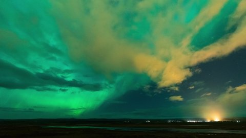 High resolution time lapse footage of a very strong northern lights also known as Aurora borealis in Iceland.