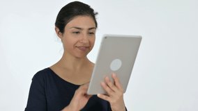 Video Chat on Tablet by Young Indian Woman White Background.