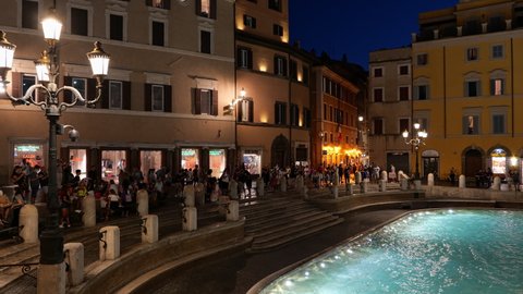 Rome, Italy - Circa September, 2020: Trevi Fountain at night, panning to right from Piazza di Trevi square, famous city landmark