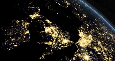 United Kingdom at night in the earth planet rotating from space