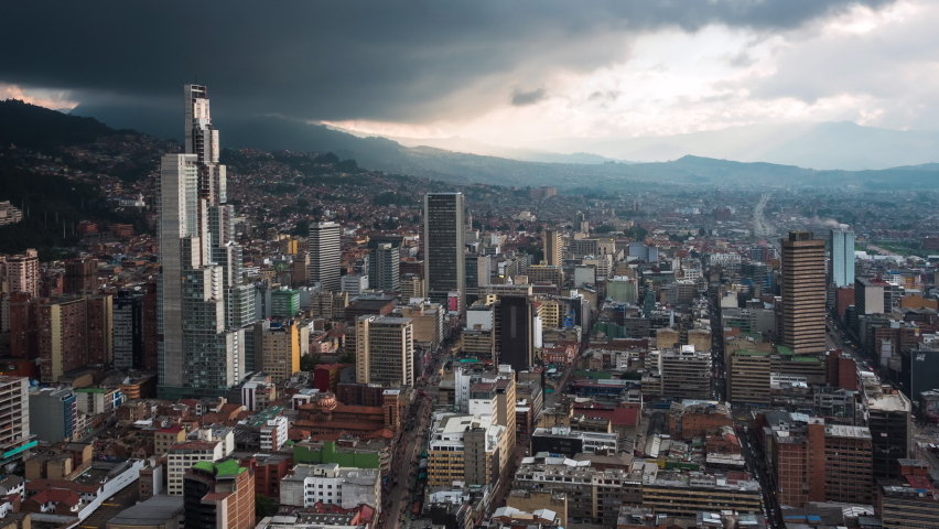 Zoom out timelapse view of dramatic skies over Bogota, the capital and largest city in Colombia.