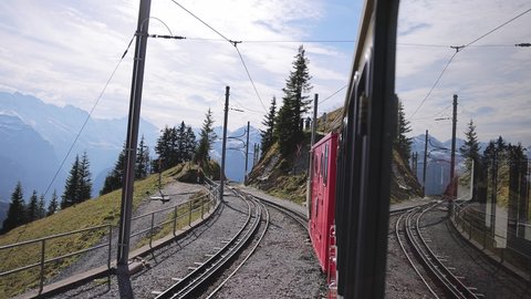 Famous cog railway on the mountain Schynige Platte in Switzerland - COUNTY OF BERN, SWITZERLAND - OCTOBER 9, 2020