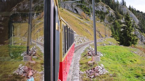 Famous cog railway on the mountain Schynige Platte in Switzerland - COUNTY OF BERN, SWITZERLAND - OCTOBER 9, 2020