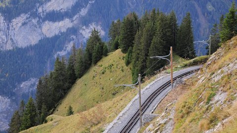 Famous cog railway tracks on the mountain Schynige Platte in Switzerland. travel photography