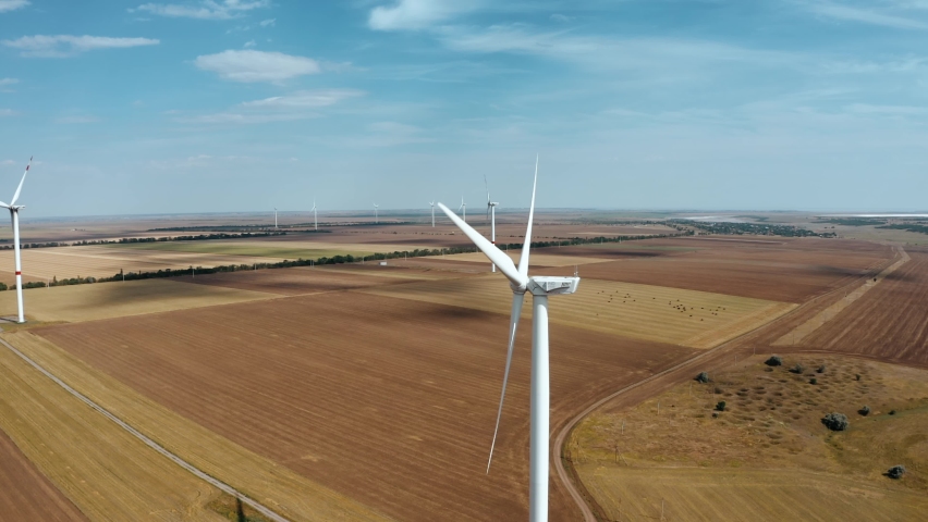 Wind farm top view. Alternative natural source, preservation of ecology. | Shutterstock HD Video #1061249524