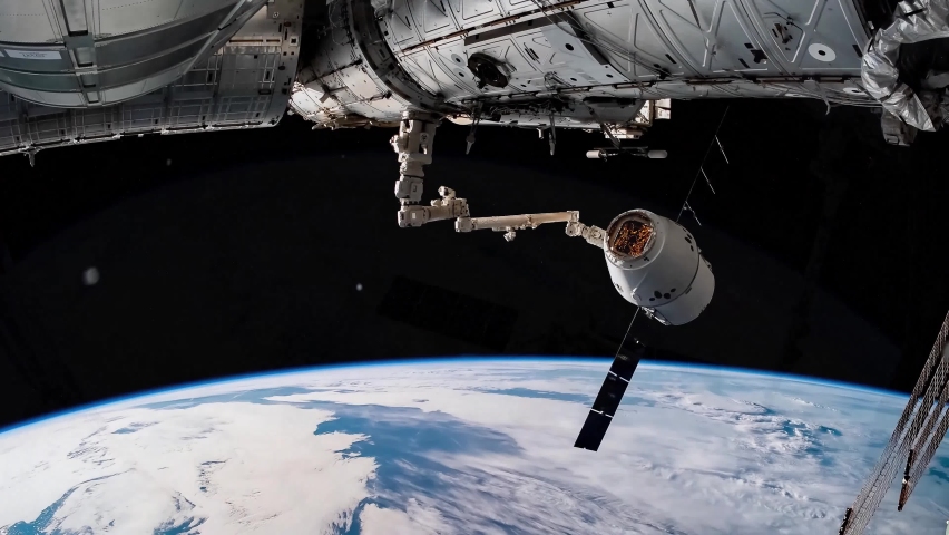 4K Timelapse of Earth seen from space featuring Space X Crew Dragon docking to The International Space Station. Image courtesy of NASA. Royalty-Free Stock Footage #1061261431