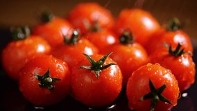 Red Tomatoes With Drops of Water, Macro 4k Video, organic vegetables food, Organic harvest in garden, farming, agriculture
