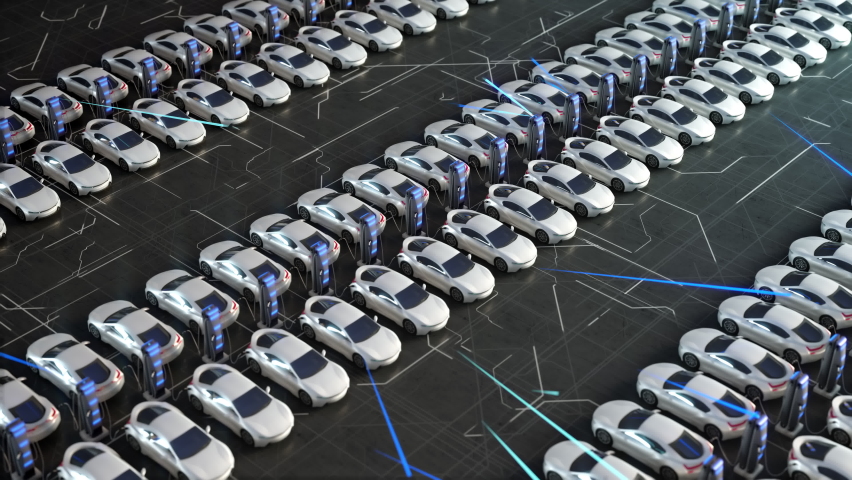 Parking lot with electric charging stations for electric vehicles. Aerial view of new electric self driving cars on car on a huge car dealership parking lot. Royalty-Free Stock Footage #1061300680