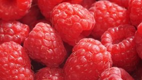 Fresh and sweet raspberries background rotation. HD