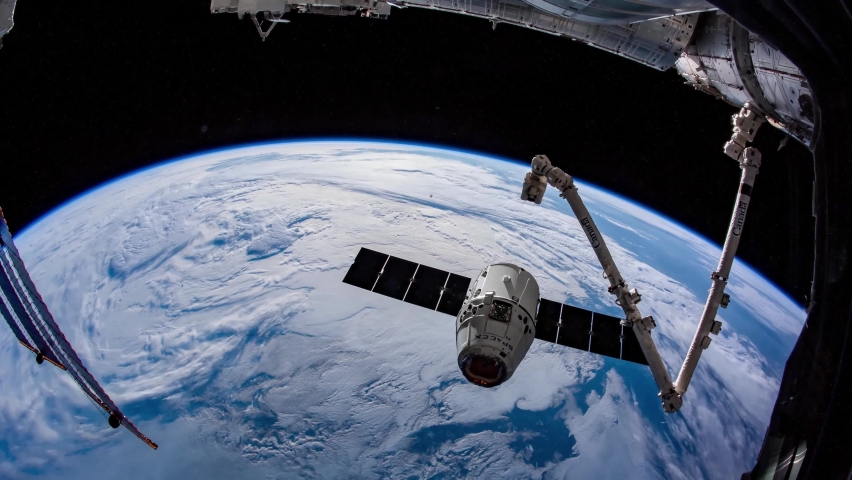 4K Timelapse of Earth seen from space featuring Space X Crew Dragon docking to The International Space Station. Image courtesy of NASA. Royalty-Free Stock Footage #1061319100
