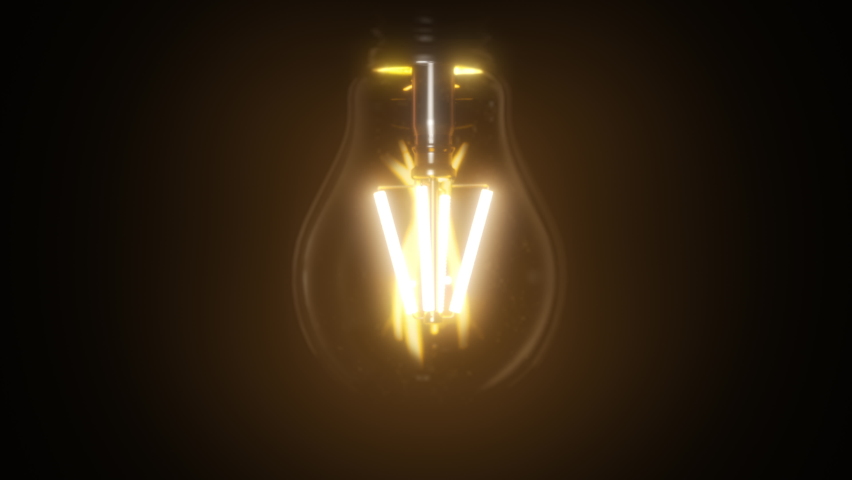Switching on, turning off light bulb animation. Warm yellow light over dark black background. Bright glowing and flickering Edison, Tungsten lamp. Retro vintage form. Creative idea concept. 3D 4K clip Royalty-Free Stock Footage #1061333245