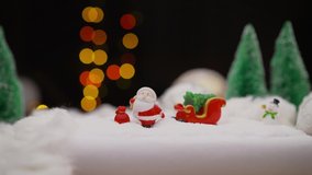 Toy Santa Claus and snowman on a Christmas background. toy snowman in the winter yard. Merry Christmas and Happy New Year. Santa Claus and Christmas tree on a white background. - Powered by Shutterstock - Get 15% off with code: PIKWIZARD15