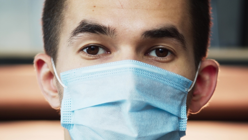 Portrait of man warehouse worker and engineer under inspection and checking production process on factory station, male wearing safety mask to protect coronavirus covid 19 in factory. | Shutterstock HD Video #1061354140